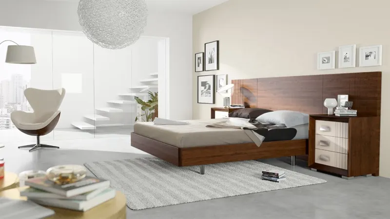 Dormitorio moderno con cabecero de madera